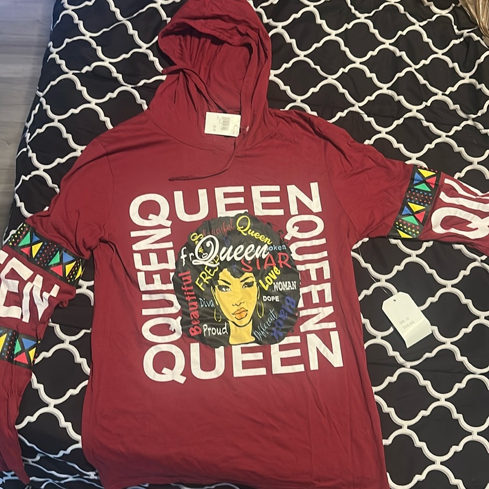 Long sleeve wine colored shirt with a hood